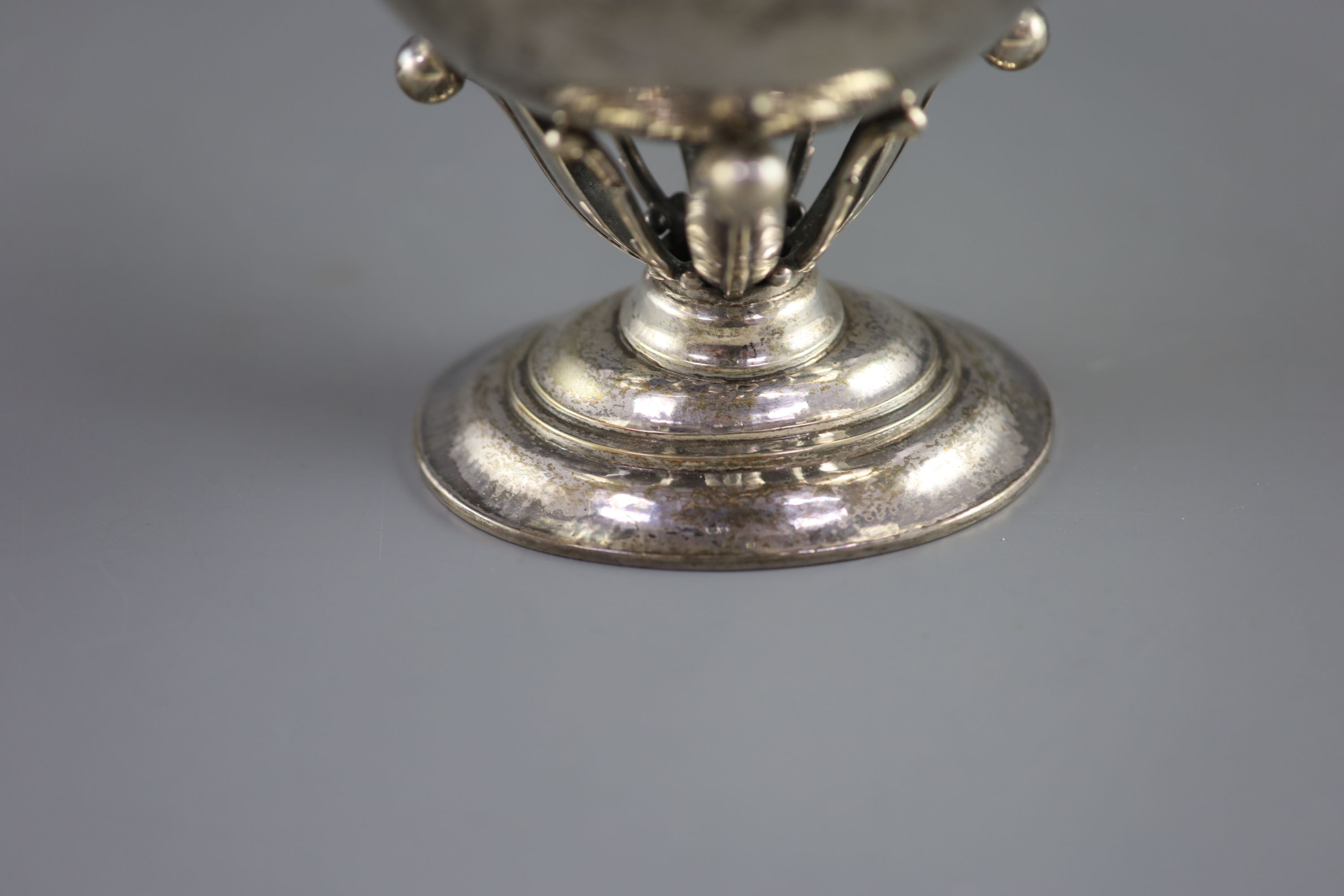 An early 20th century Georg Jensen planished sterling silver circular pedestal bowl